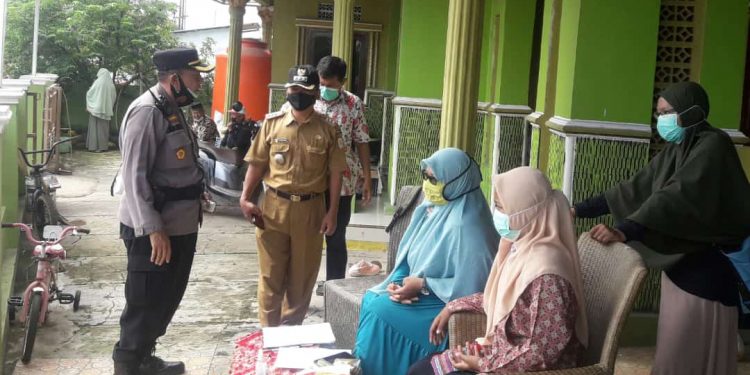 PASTIKAN TERTIB, AMAN DAN LANCAR, MUSPIKA KECAMATAN ARJAWINANGUN MEMANTAU PEMULANGAN 118 SANTRI PONDOK PESANTREN BINA INSAN MULIA