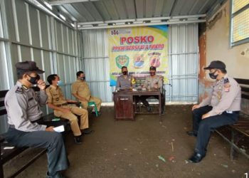 SEBAGAI BENTUK UPAYA PENCEGAHAN TERHADAP PENYEBARLUASAN VIRUS COVID-19, DESA GINTUNG KIDUL BANGUN POSKO PPKM SKALA MIKRO.