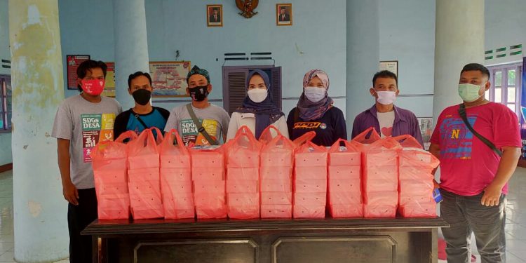 PEMDES PLUMBON BERBAGI DAN BERAMAL KEPADA SESAMA DIBULAN RAMADHAN