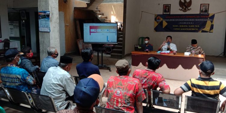 Camat Sukana Berikan Sosialisasi Dan Bimtek Aplikasi Sistem Informasi Manajemen Pemerintah Desa (SARASA)