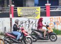 Spanduk Protes Lemahnya Pengawasan Program MBG, Desak Penutupan Dapur SPPG Tanpa IPAL